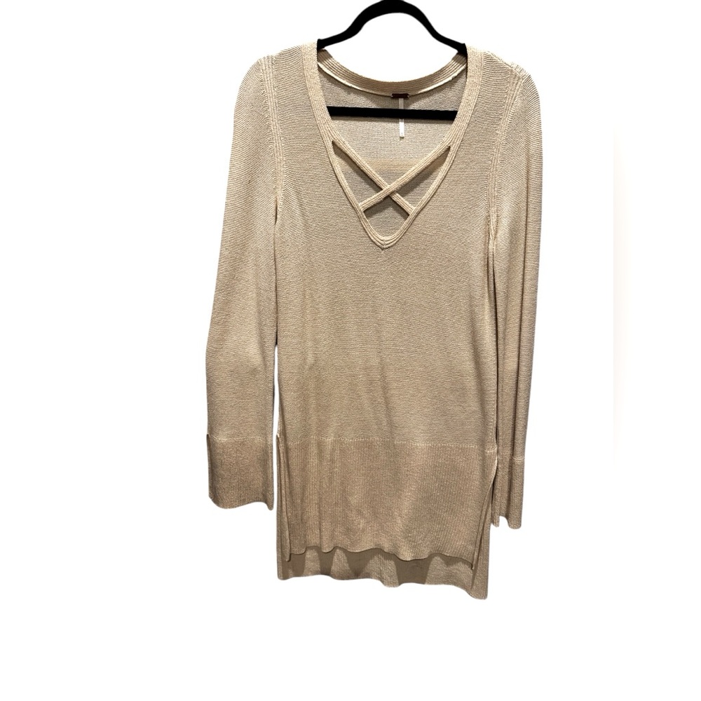 Long sleeve light sweater dress/long top, has slits on the sides and sleeves.